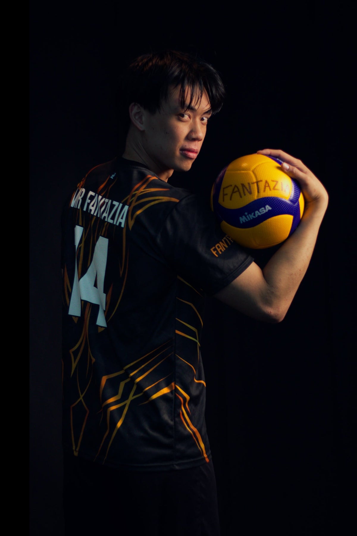 Custom Fantazia jersey, back view with player name and number 14 above the kitsune flame graphic